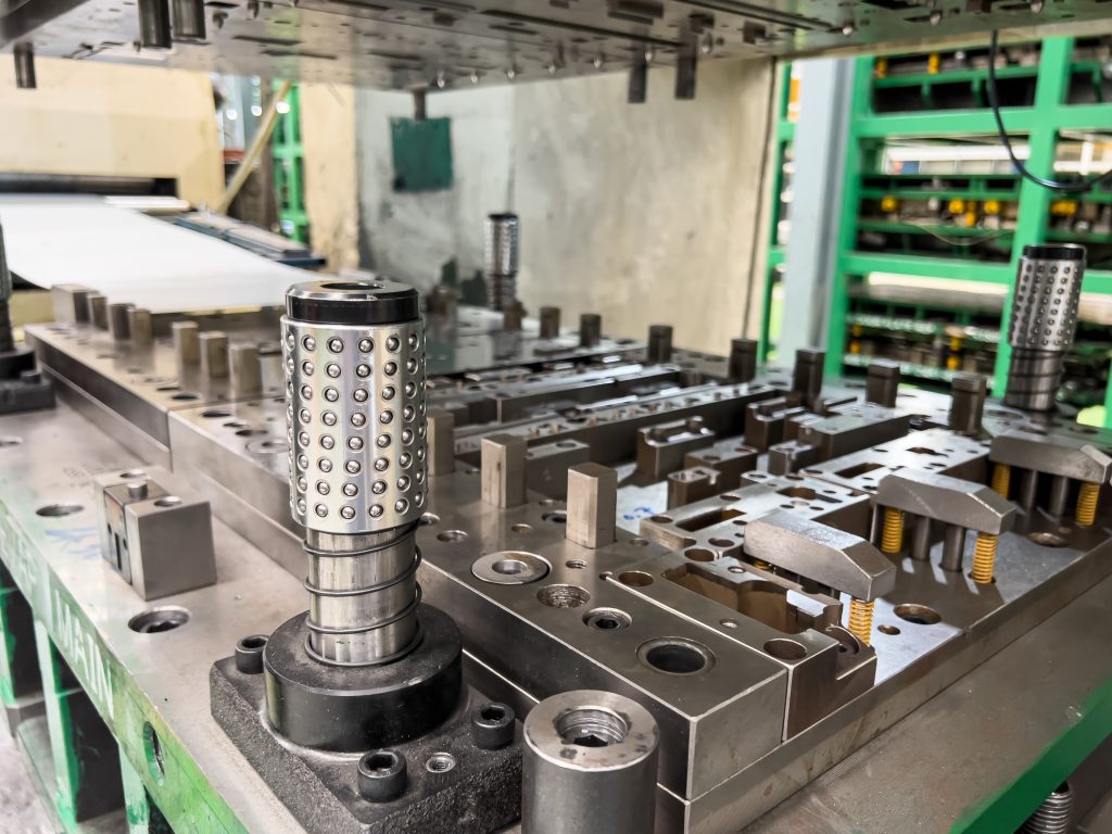 Stage Tooling vs Progressive Tooling