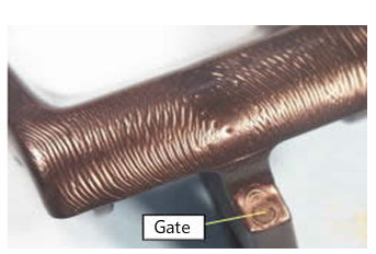 Flow Marks Due to Improper Gate Design/Location
